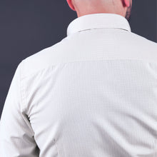 a man wearing a white shirt and a black tie