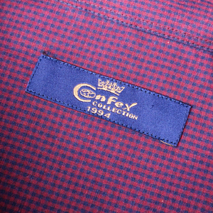 a close up of a label on a shirt