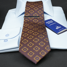 a close up of a tie on a table