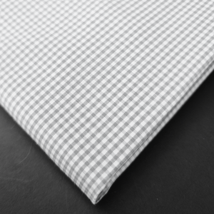 a close up of a white and black checkered fabric