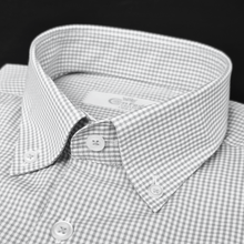 a close up of a white and black checkered shirt