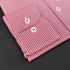 a close up of a red and white checkered shirt